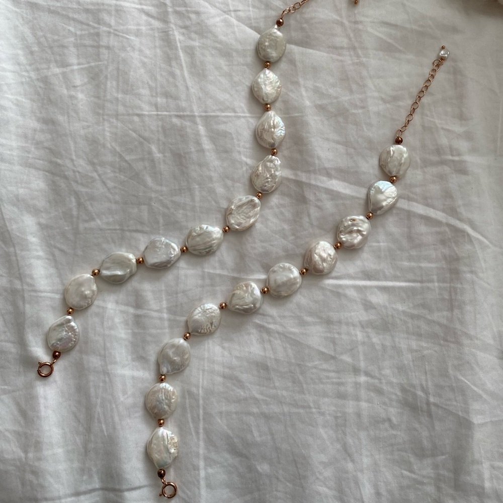 Two pearl anklets